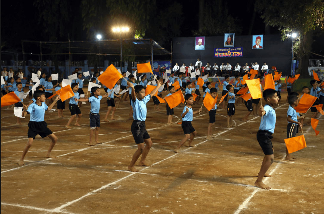 Children taking part in a coordinated performance